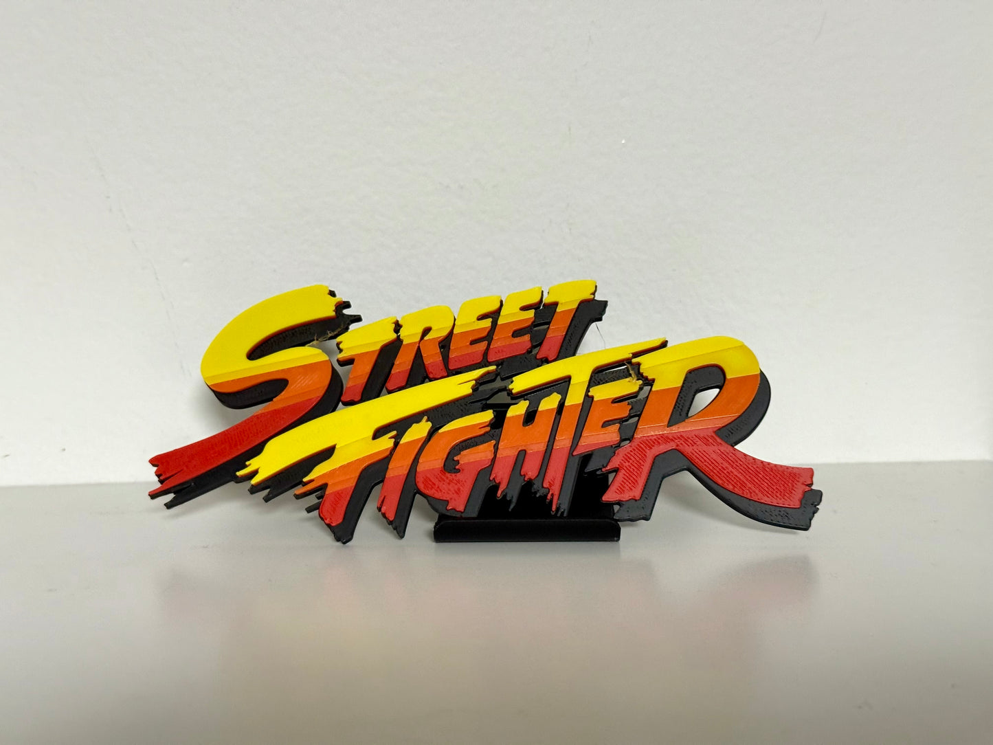 Street Fighter 3D Logo Display for m Action Figures, LEGO, Comics, and More.