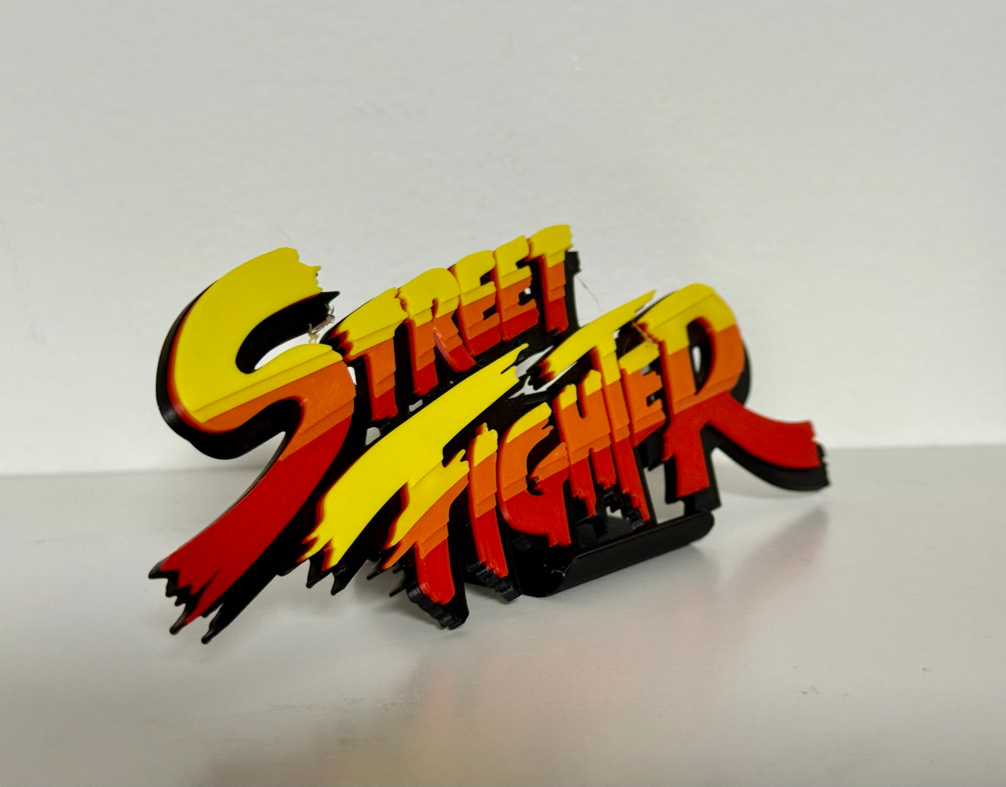 Street Fighter 3D Logo Display for m Action Figures, LEGO, Comics, and More.