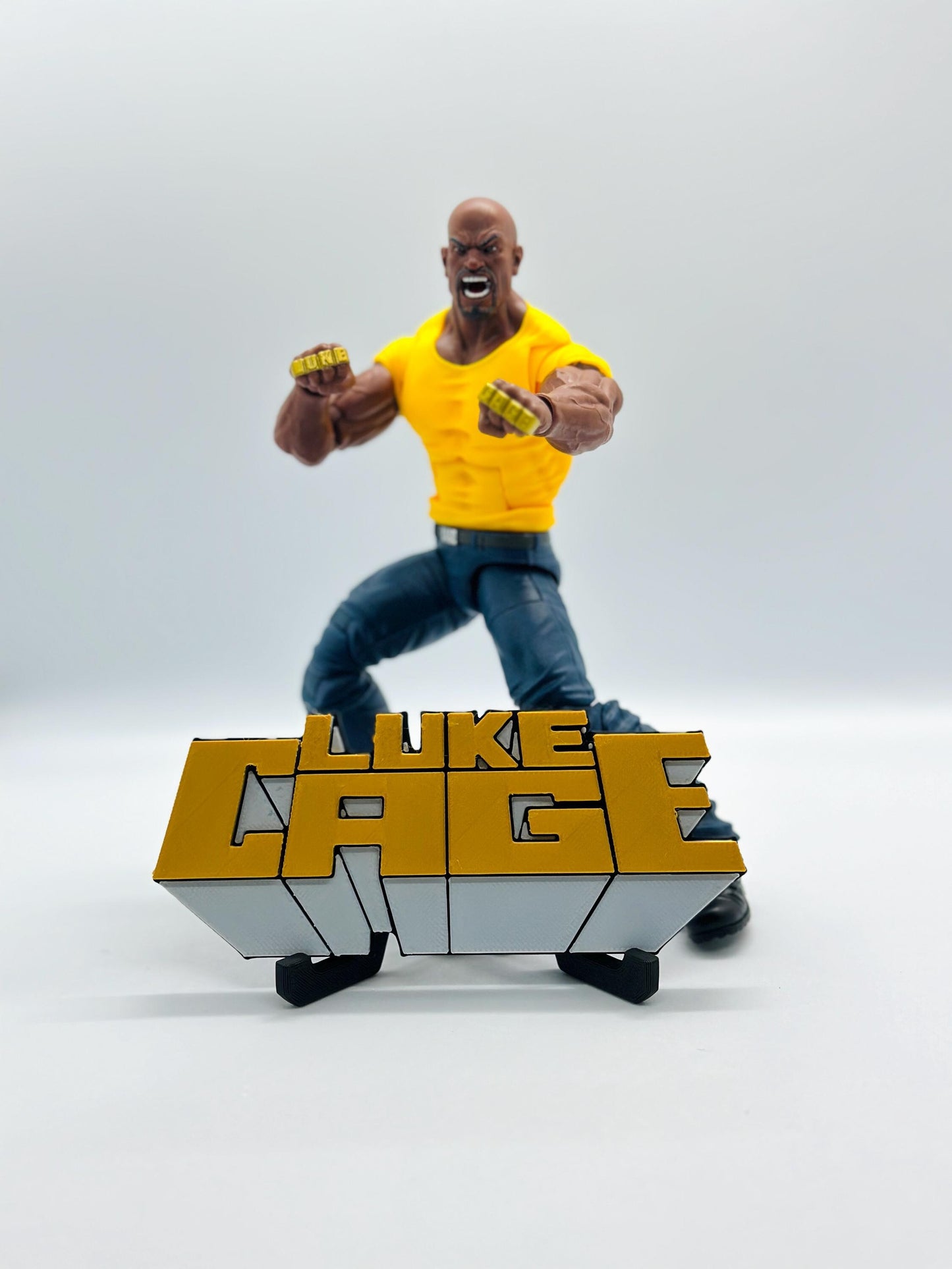 Luke Cage 3D +Magnetic Logo Display for Marvel Legends Action Figures, LEGO, Funko, Comics, and More.