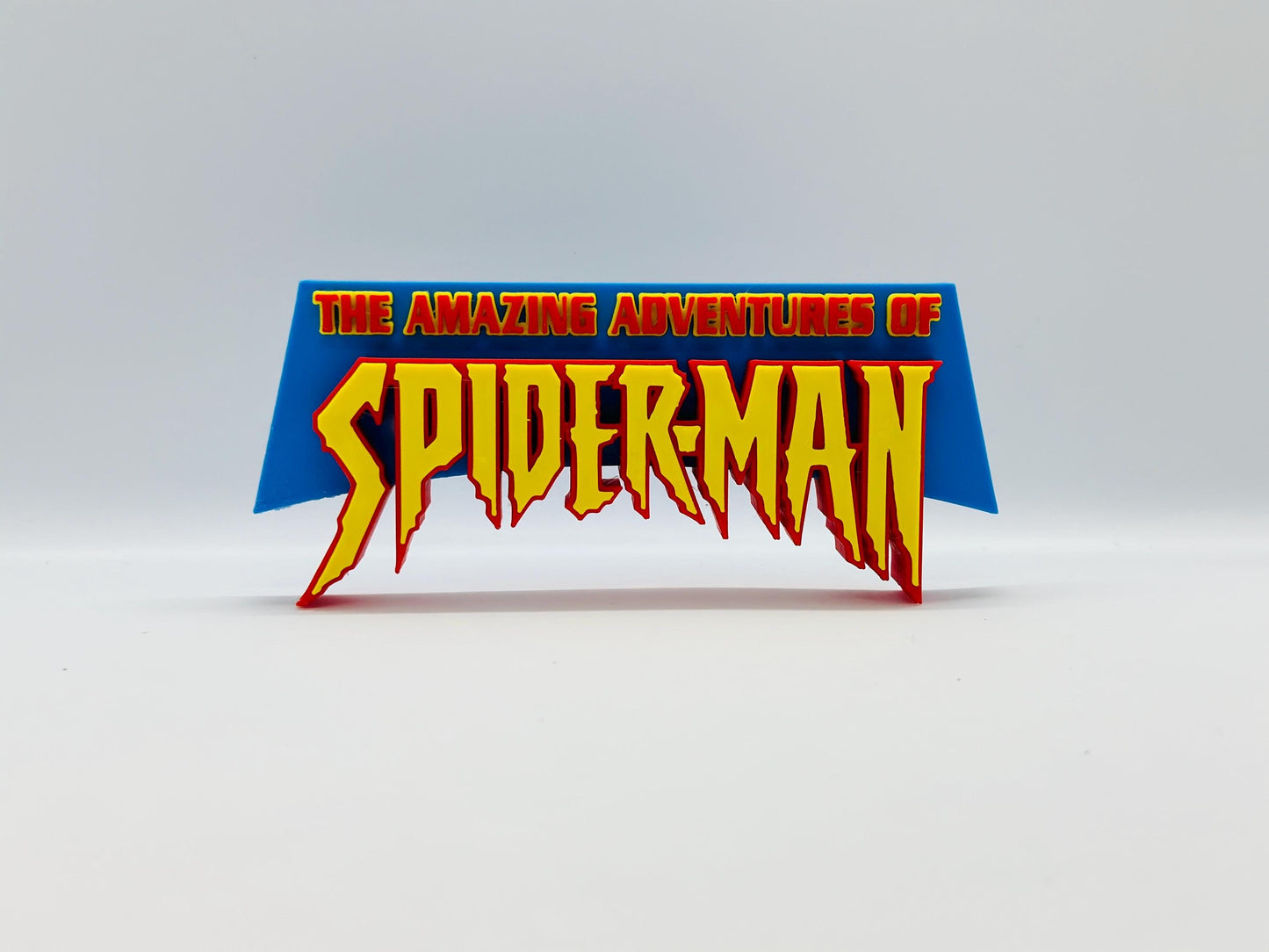 Spider-Man 3D + Magnetic Logo Amazing Adventures Display. Comes with stand and Magnetic.