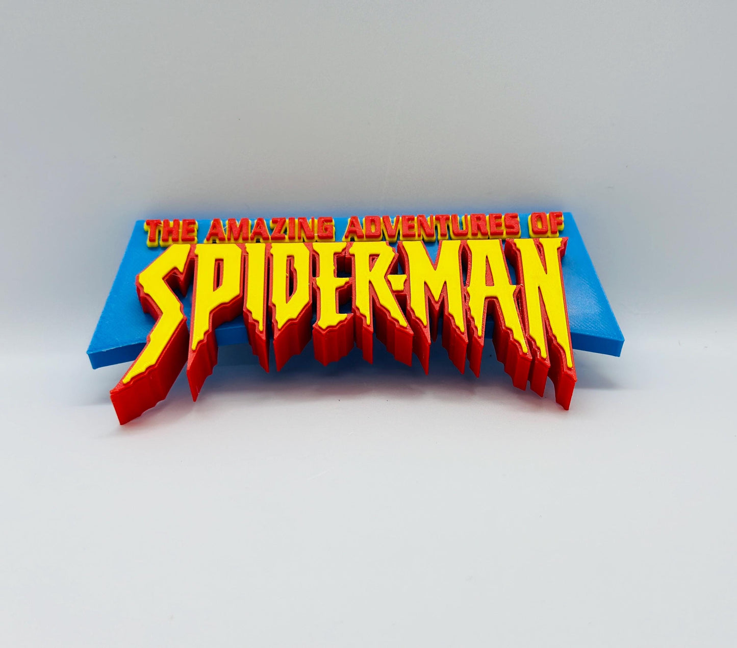 Spider-Man 3D + Magnetic Logo Amazing Adventures Display. Comes with stand and Magnetic.