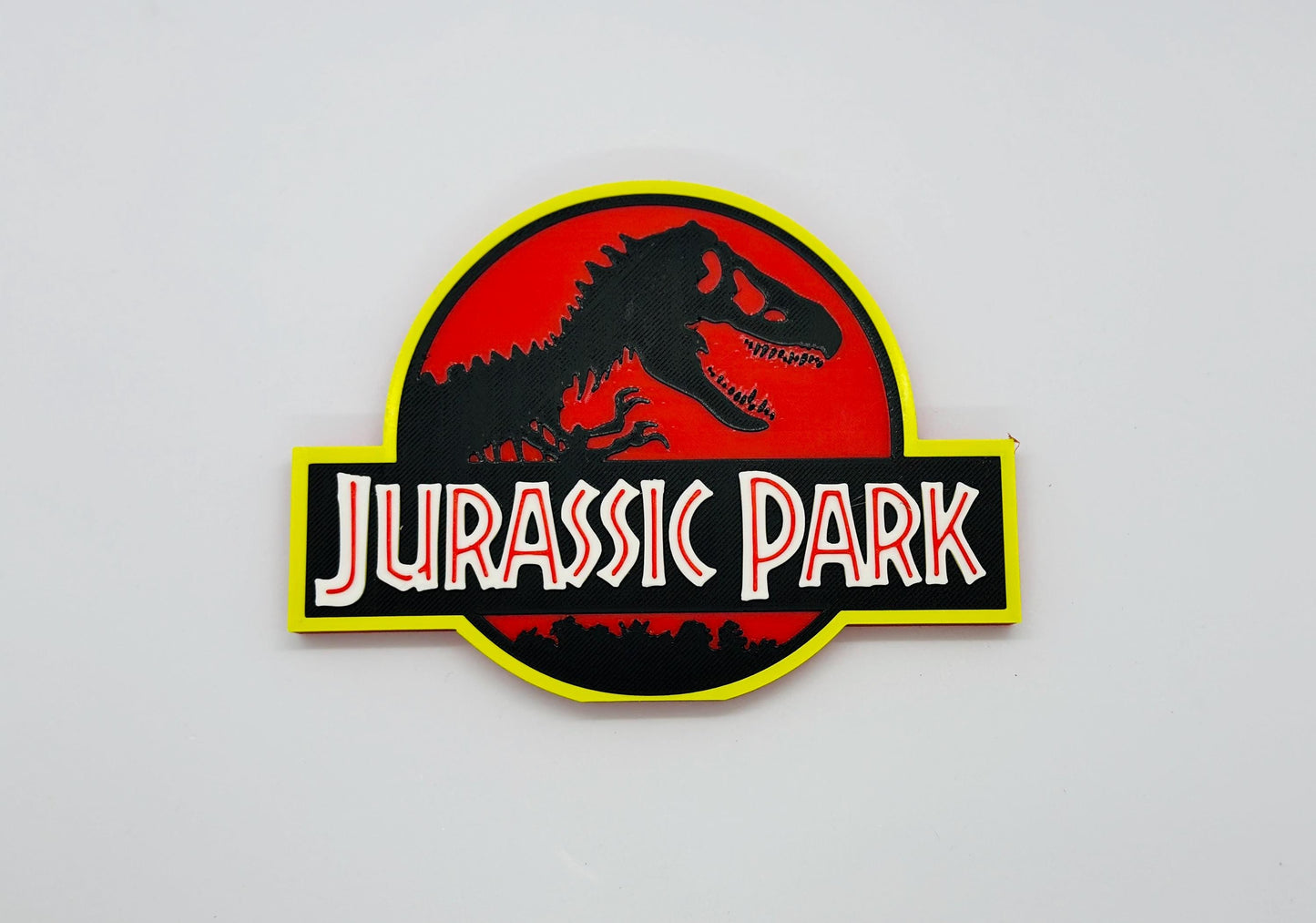 Jurassic Park Logo Display for Action Figures, LEGO, Comics, and More.
