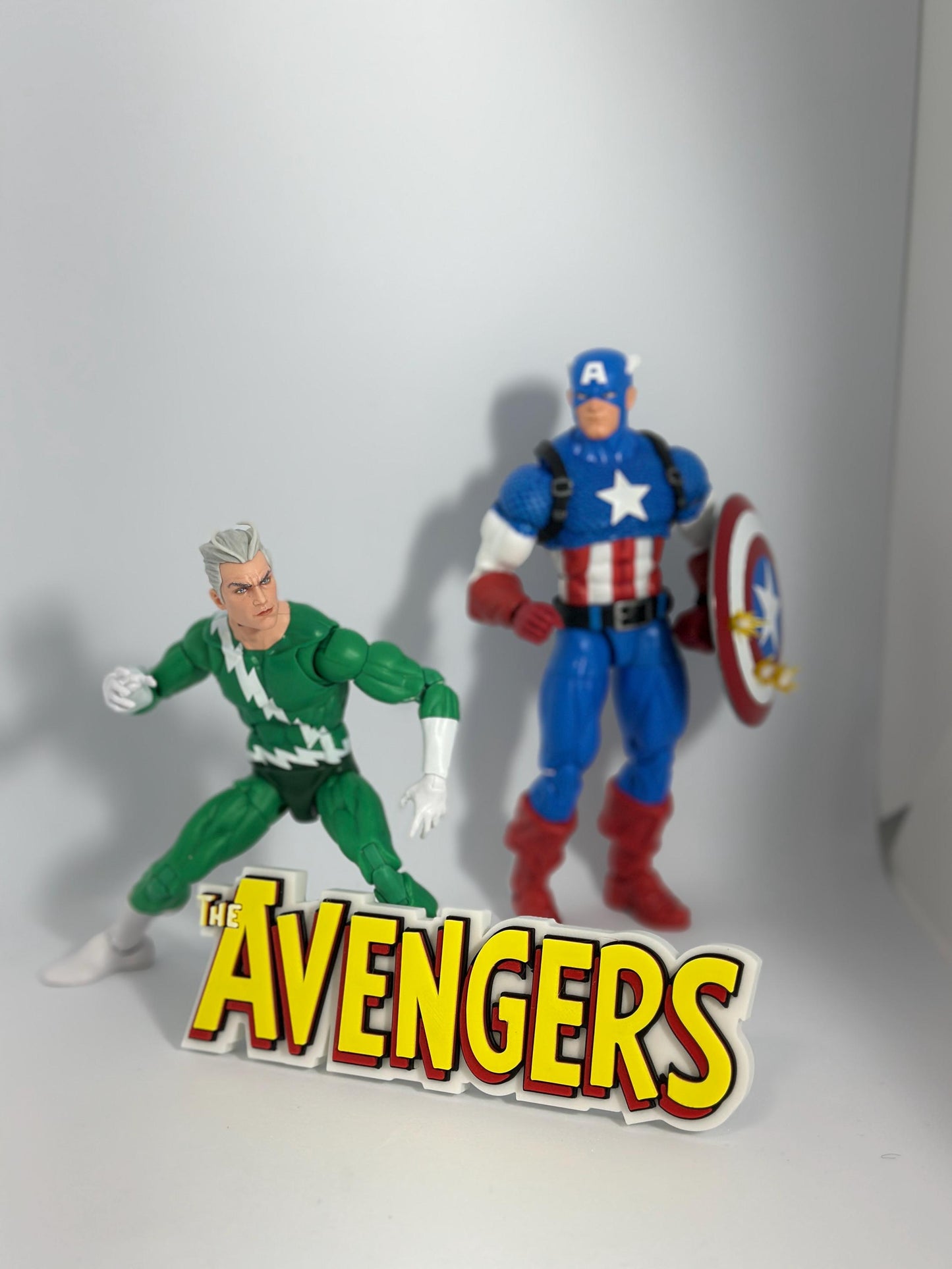 The Avengers classic Logo Display for Marvel Legends Action Figures, LEGO, Funko, Comics, and More.