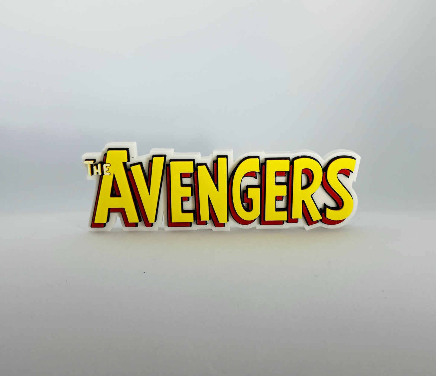 The Avengers classic Logo Display for Marvel Legends Action Figures, LEGO, Funko, Comics, and More.