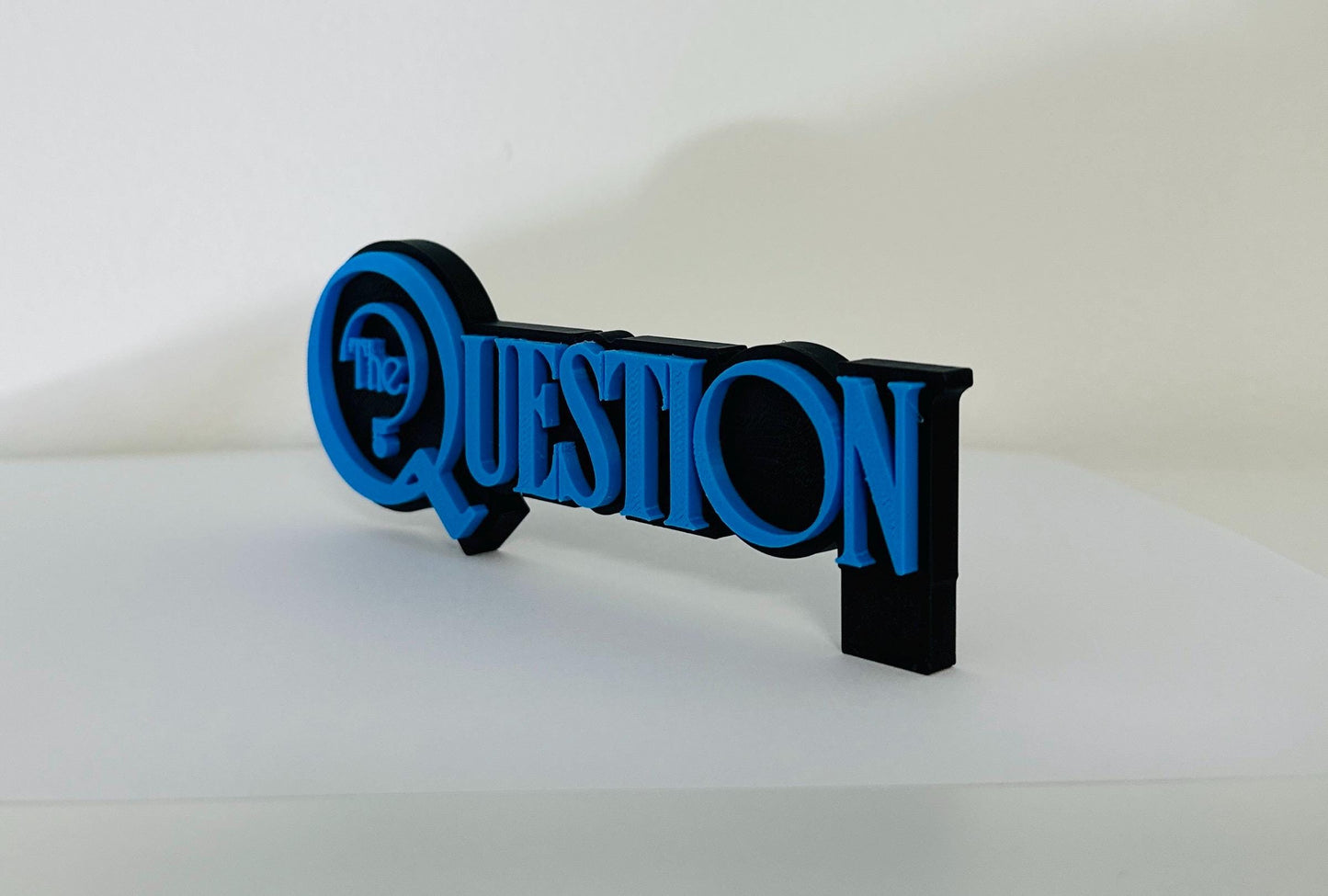 The Question 3D Logo Display for MCfARLANE TOYS Action Figures, LEGO, Comics, and More.