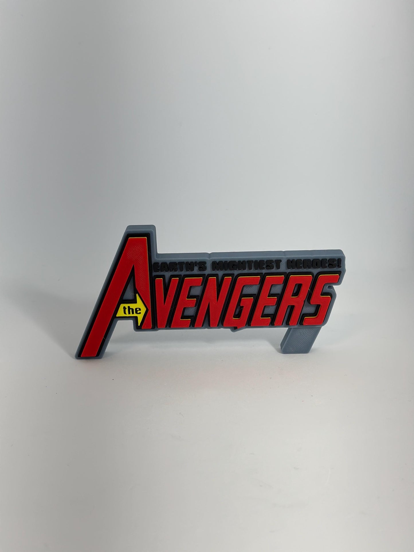 The Avengers Logo Display for Marvel Legends Action Figures, LEGO, Funko, Comics, and More.