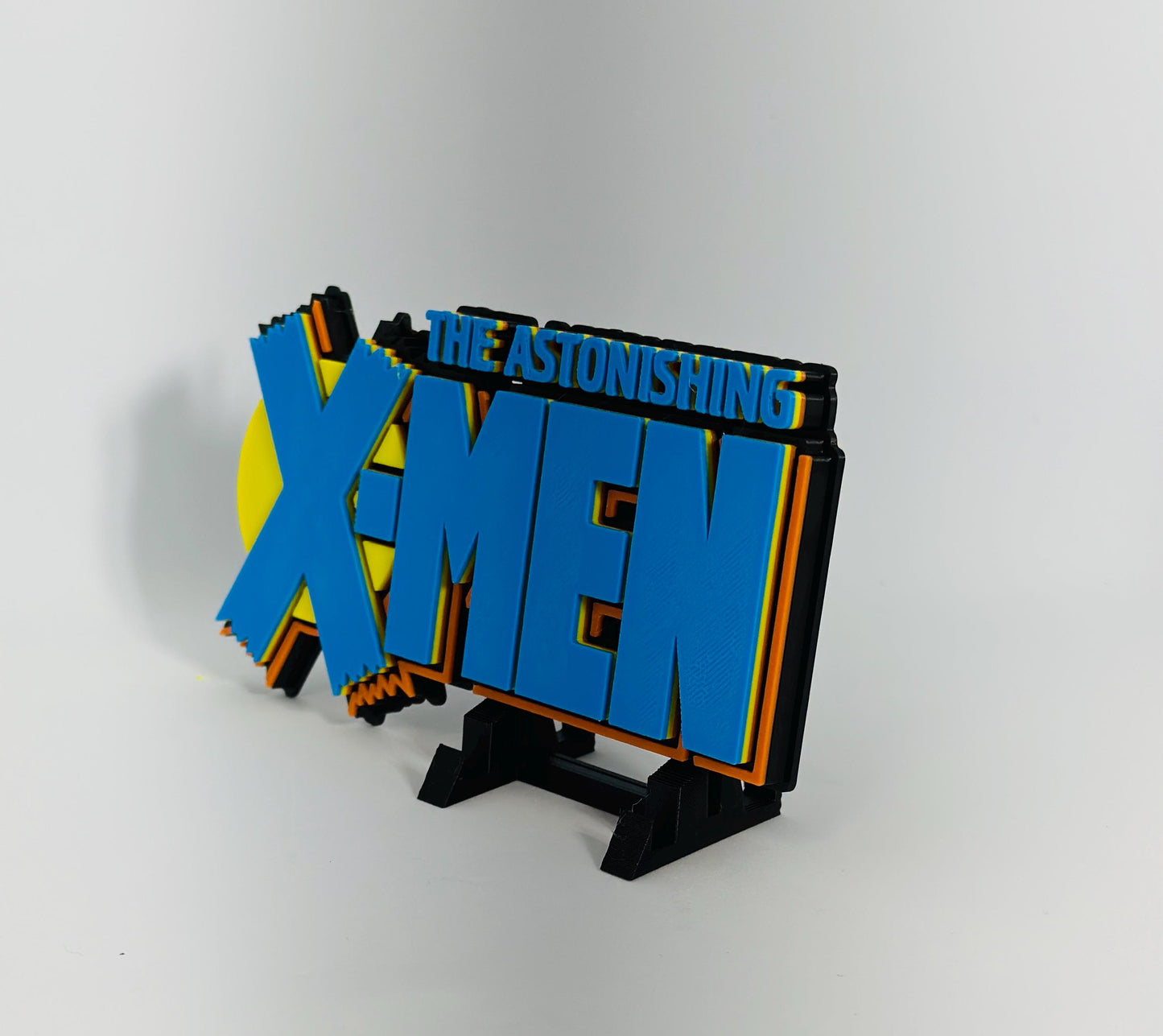 The astonishing XMEN 3D Logo Display for Marvel Legends Action Figures, LEGO, Comics, and More.