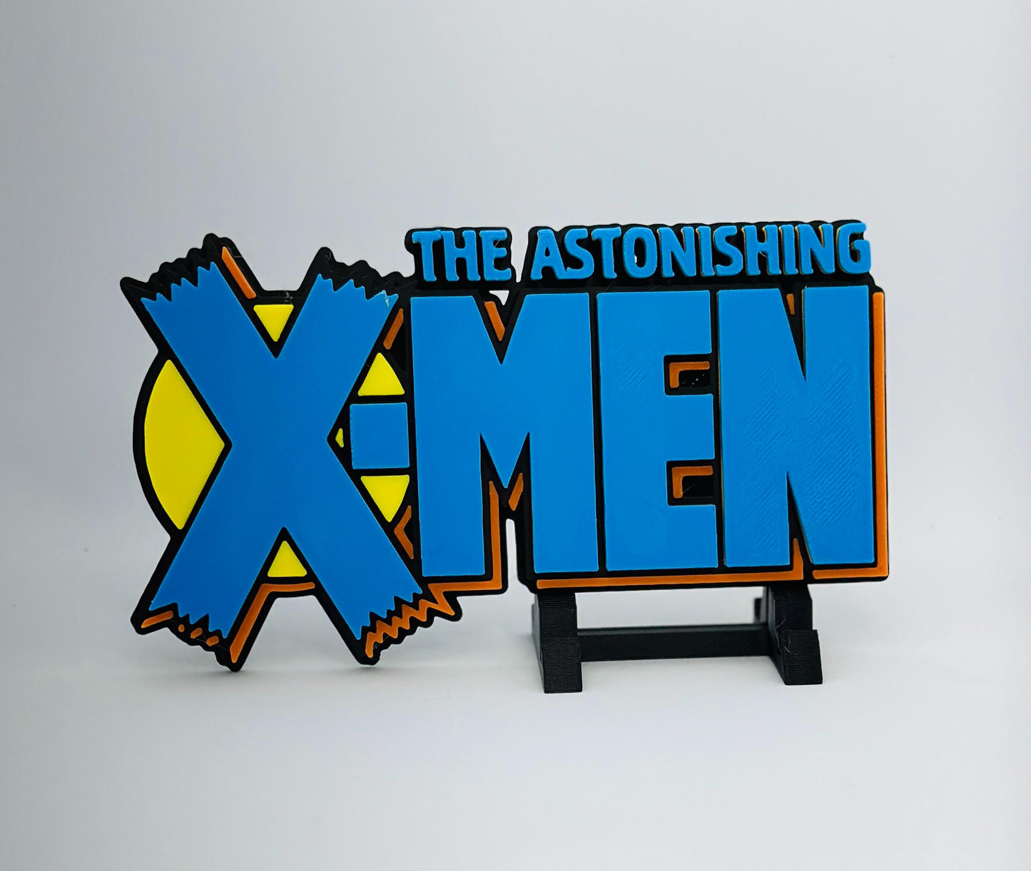 The astonishing XMEN 3D Logo Display for Marvel Legends Action Figures, LEGO, Comics, and More.