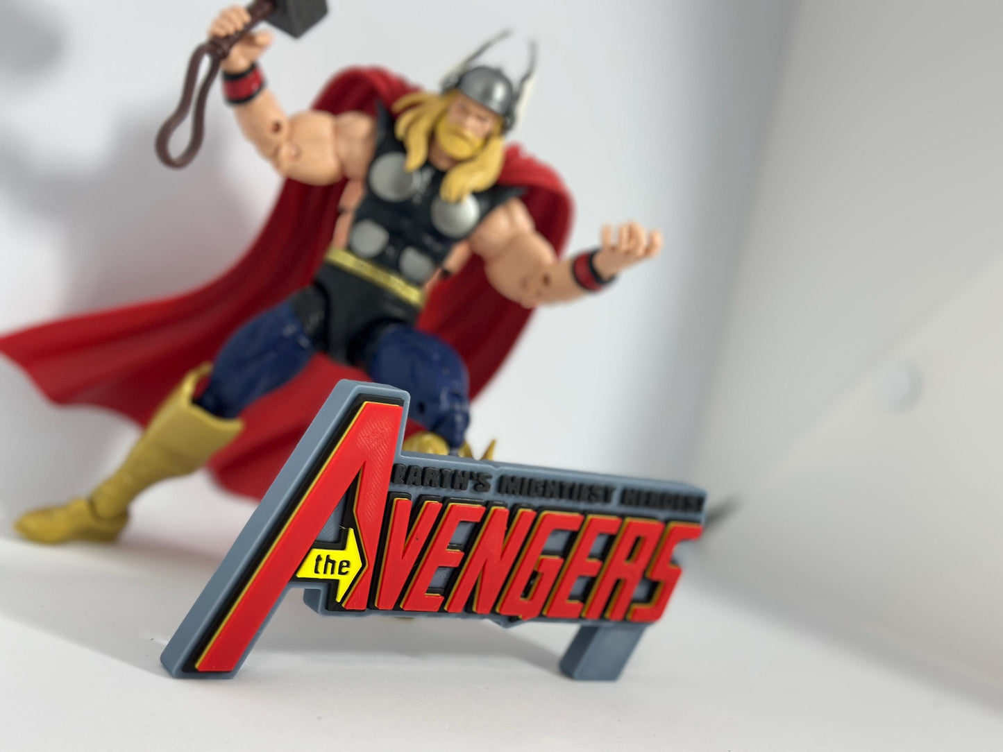 The Avengers Logo Display for Marvel Legends Action Figures, LEGO, Funko, Comics, and More.