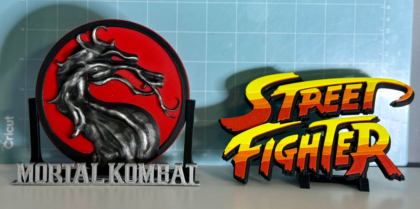 Mortal kombat and street fighter 2 logos.