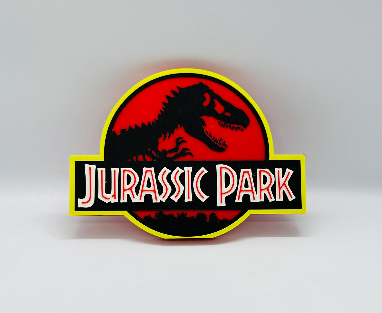 Jurassic Park Logo Display for Action Figures, LEGO, Comics, and More.